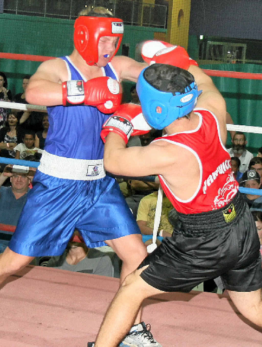 Harley Gonzalez and Jacob Davis swing punches. Harley Gonzalez and Jacob Davis swing punches.